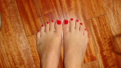 Red feet nail polish