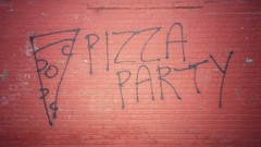 Red graffiti pizza party writing wall painting