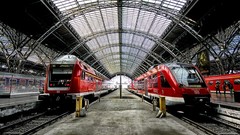 Red ice Station platform vehicles trains train stations