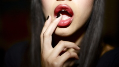 Red lips mouth fingers