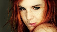 Sand woman faces redheads portraits bite lip