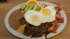 Sausages food eggs oranges bacon