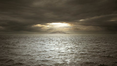 Sea clouds Island waves shining stormy