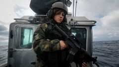 Sea woman Guns soldiers patrol