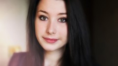 Simple woman brown eyes black hair jester