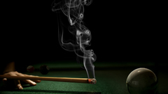 Smokes billiards tables