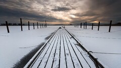 snow landscape clouds sky pier frozen lake winter ice