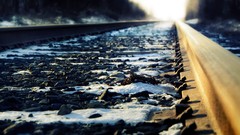 Snow Railways pebbles rocks railroad tracks