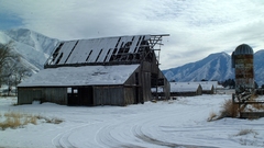 Snowy barn abandoned farm