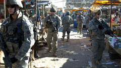 Soldiers patrol market military