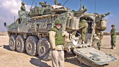 Soldiers tanks stryker