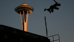 Space needle and high skateboarder Resolution aloft