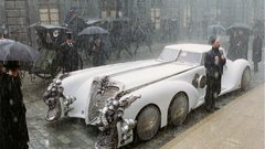 Streets rain white cars