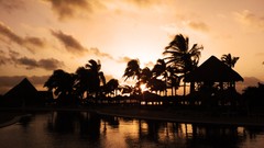 Sunrise Mexico palm trees Beaches huts swimming pools