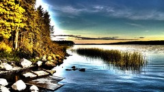 Sunrise sunset stones nature Trees yellow water blue clouds 