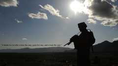 Sunset clouds military text