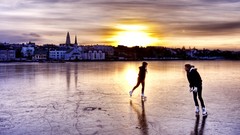 Sunset cold ice woman ice skates