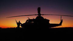 Sunset Guns Helicopters silhouettes