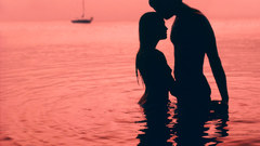 Sunset ocean couple sail