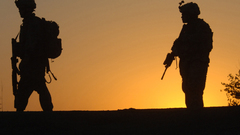 Sunset soldiers silhouettes