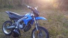 Sunset sun black blue tuning moped sweden Derbi shiny Swedish 