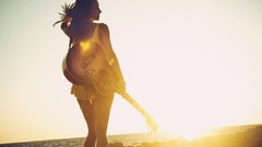 Sunset woman guitars Ana Free