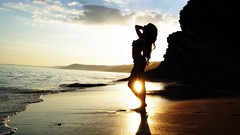 Sunset woman silhouettes Beaches sunlight blue bikini