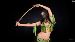Swords arms raised pierced navel green dress belly dancers