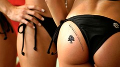 Tattoos woman bikini ass