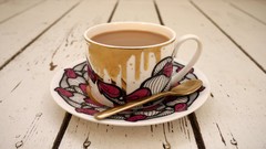 Tea cups graffiti spoons