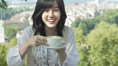 Tea woman Celebrity Actress asians cups smiling black hair 