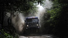 Trees water spray Paris master Red Bull rally mud trucks 