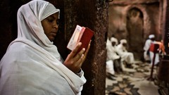 Wall Books Islam veil national geographic religion reading back 