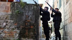 Wall War weapons Guns police alley slum Bricks Rio de Janeiro 