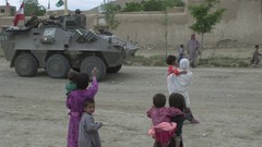 War children soldiers military patrol tanks NATO Afghanistan 