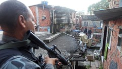 War weapons Guns police alley slum Rio de Janeiro Brazil raid 