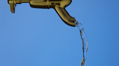 Water blue background faucets