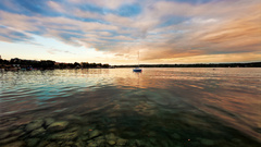 Water clouds ships stones