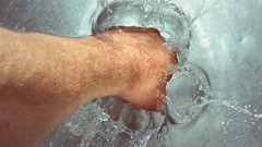 Water fists Photo manipulation artwork punching