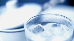 Water glass ice blurred ice cubes