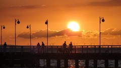 Water sunset clouds sun