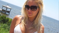 Water woman Celebrity Beaches sunglasses cleavage bikini boobs 