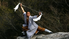 Weaponary martial artist mountain