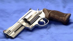 Weapons Guns blue background revolvers Smith and Wesson