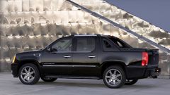 Wheel SUV parking Cadillac side view black cars pickup trucks 