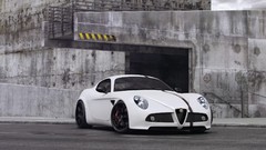White cars Alfa Romeo vehicles wheelsandmore front angle view 