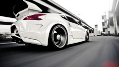 White cars Nissan Supercars