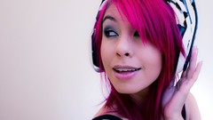 White woman headphones faces pink hair Astro astro gaming 
