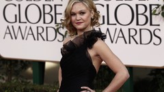 Woman Actress black dress hands on hips Julia Stiles