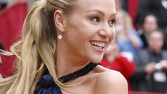 Woman Actress blondes green eyes ear rings blue dress Portia De 